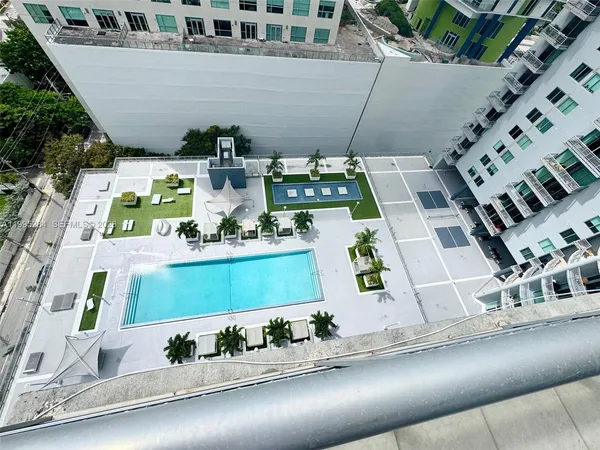 a view of building along with potted plants
