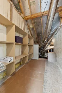 a view of a house with a swimming pool and a yard