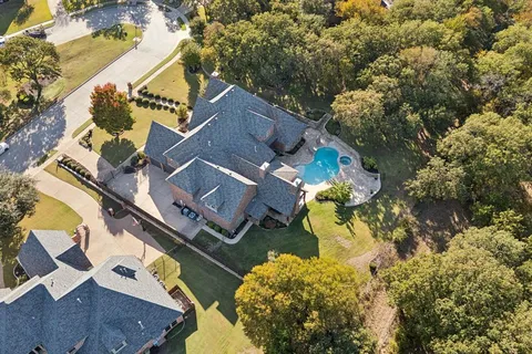 a view of a swimming pool with sitting area