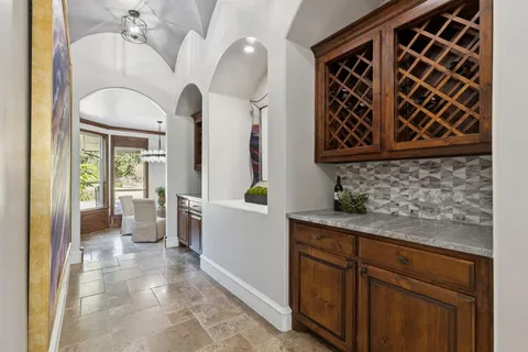 a bathroom with a sink a mirror and a shower