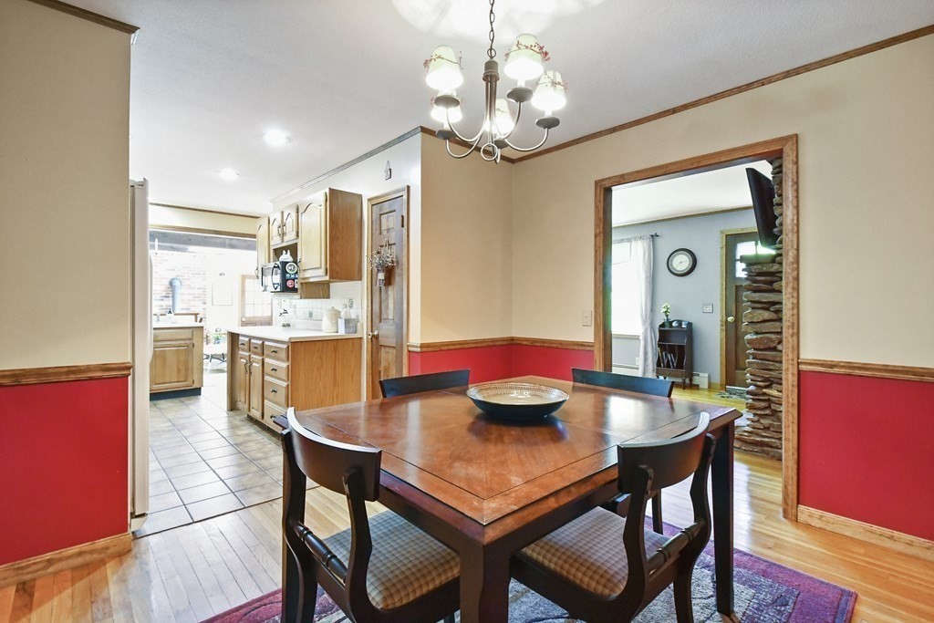 81 West Road Ashby, MA 01431 - Photo 13 of 42 a view of a dining room with furniture and wooden floor