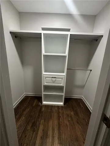 a view of an empty walk in closet
