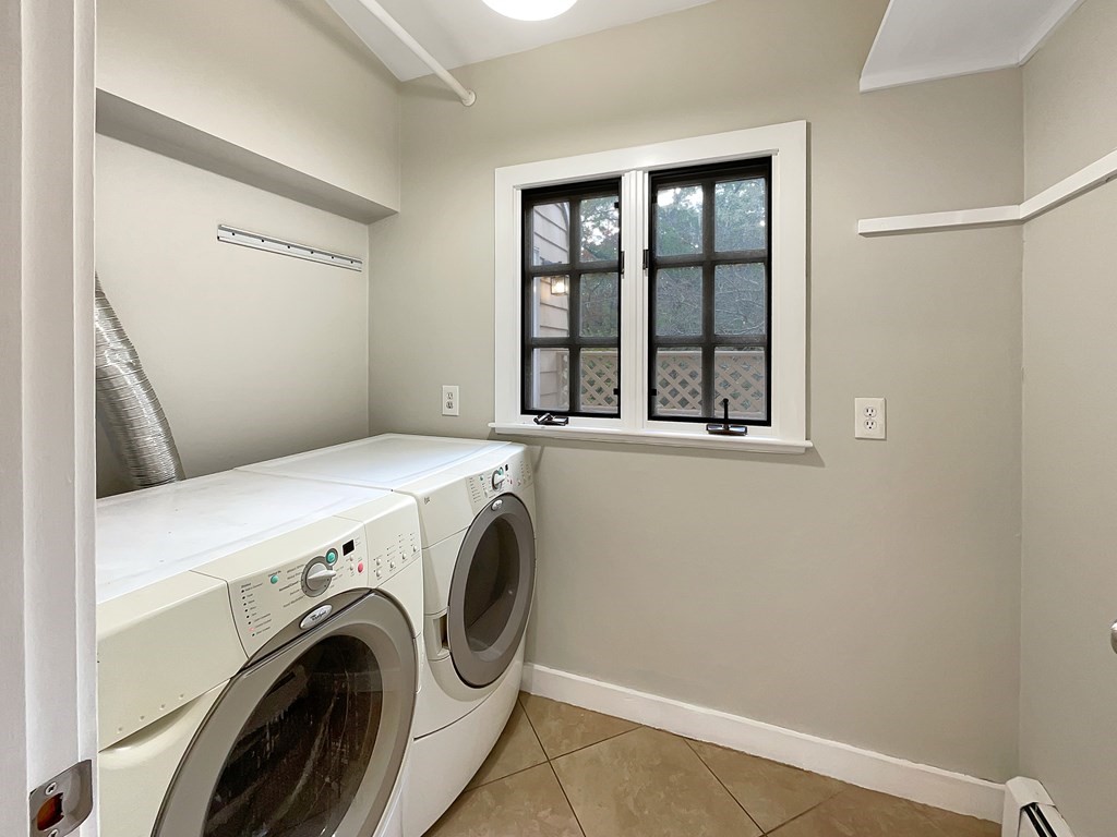 22 Watertown Street Lexington, MA 02421 - Photo 26 of 34 a utility room with dryer and washer