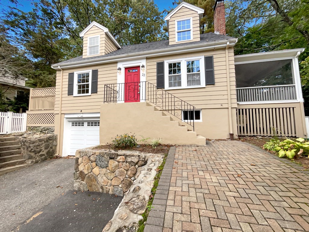 22 Watertown Street Lexington, MA 02421 - Photo 8 of 34 a front view of a house with a yard