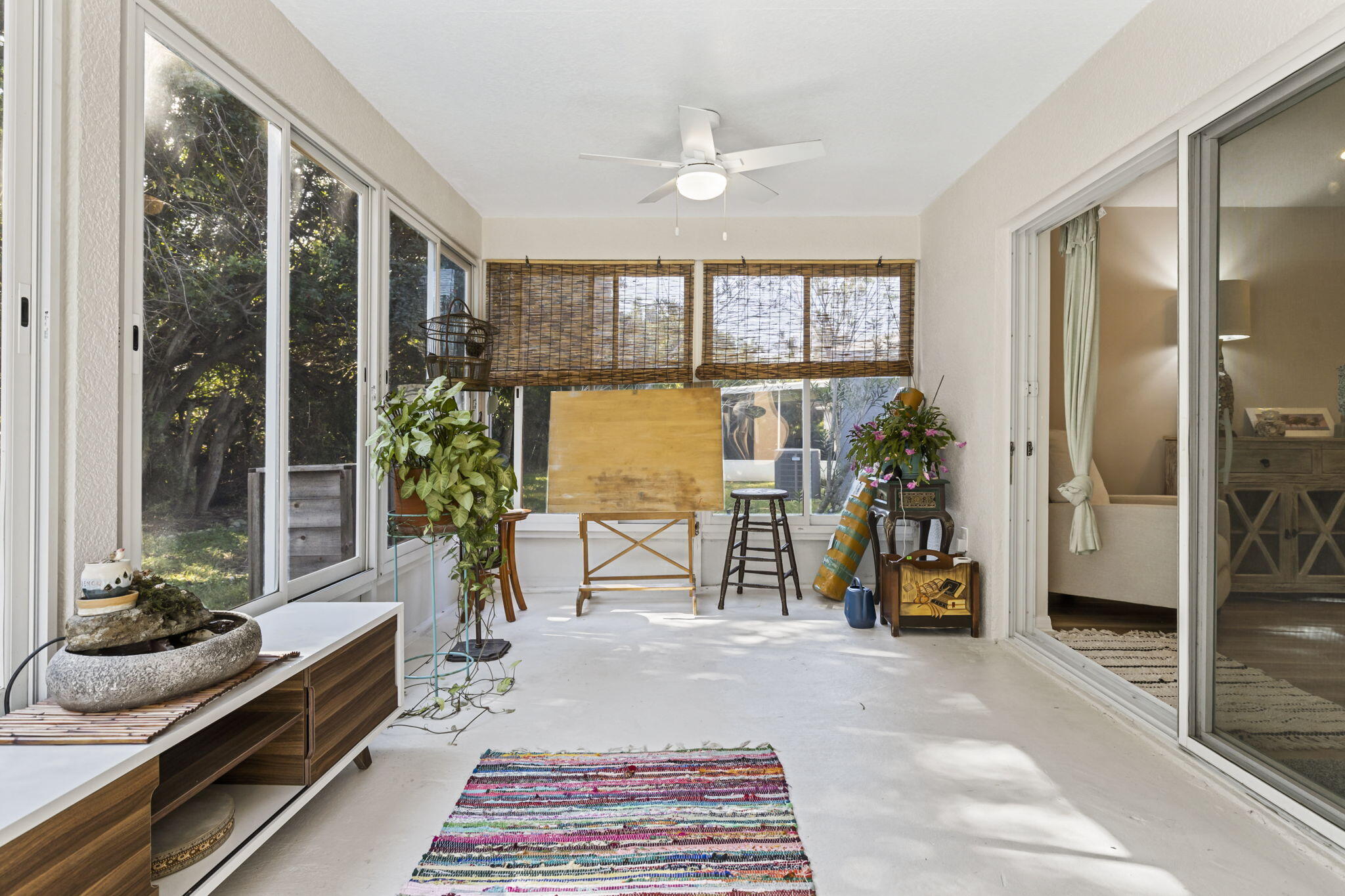 2140 Spring Creek Circle Palm Bay, FL 32905 - Photo 12 of 32 a lobby with furniture and a potted plant