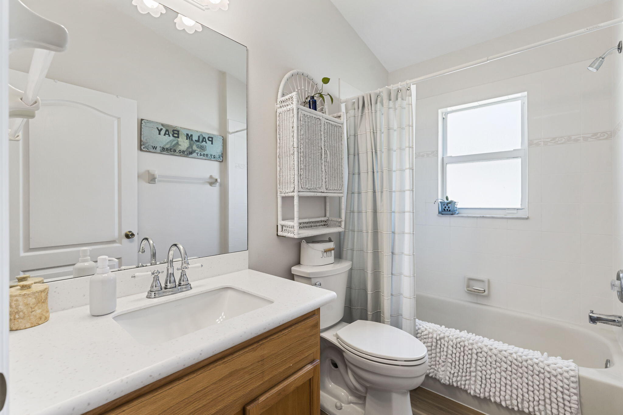 2140 Spring Creek Circle Palm Bay, FL 32905 - Photo 20 of 32 a bathroom with a granite countertop sink toilet and shower
