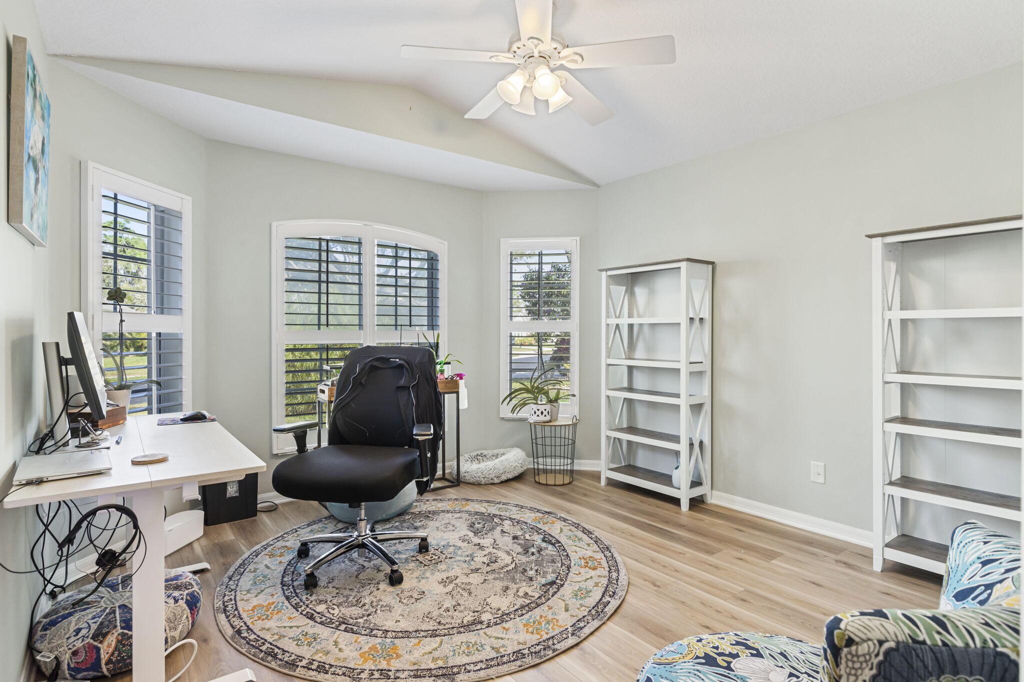 2140 Spring Creek Circle Palm Bay, FL 32905 - Photo 21 of 32 a living room with furniture and wooden floor