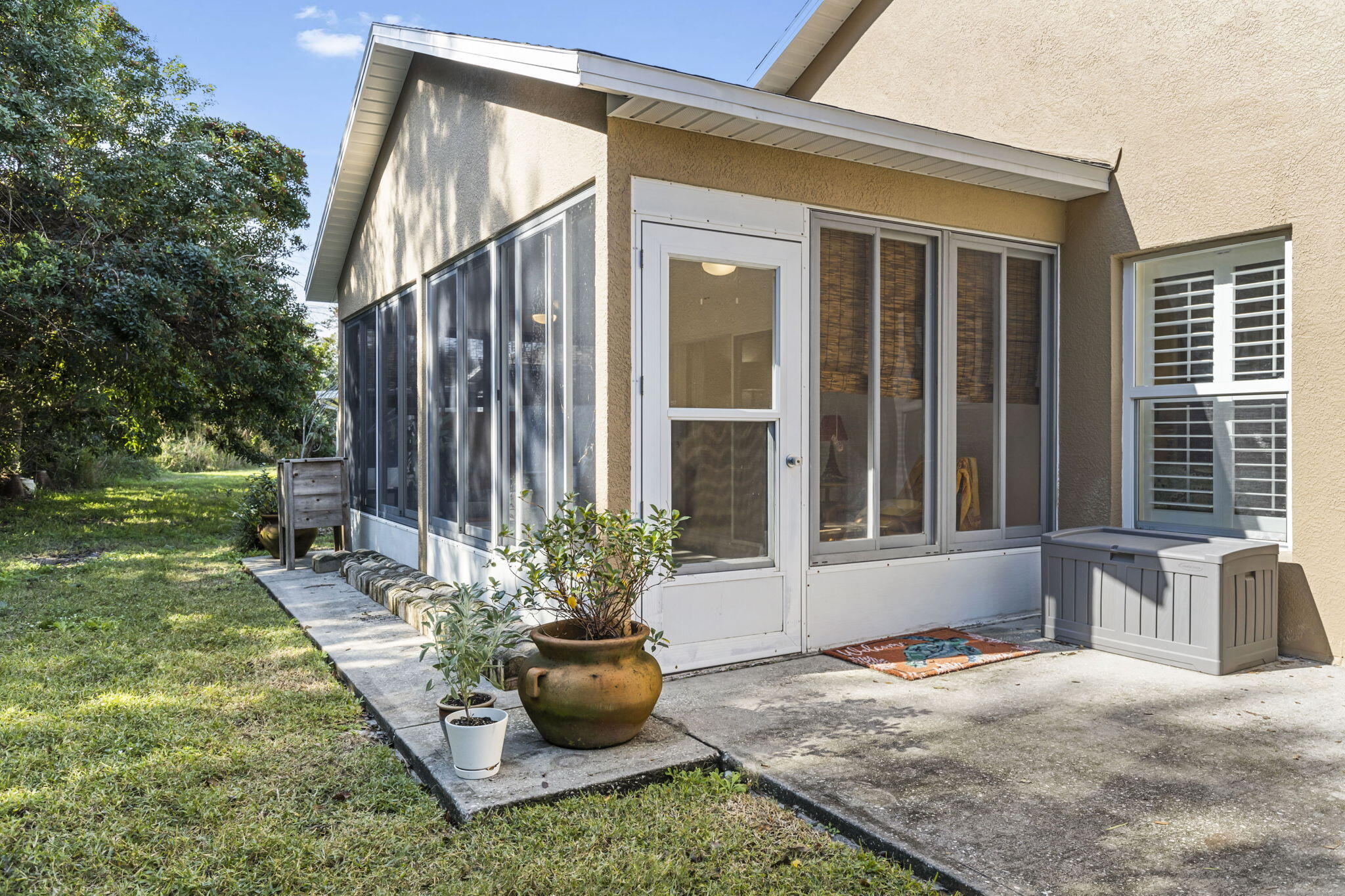 2140 Spring Creek Circle Palm Bay, FL 32905 - Photo 24 of 32 a view of a house with backyard and sitting area