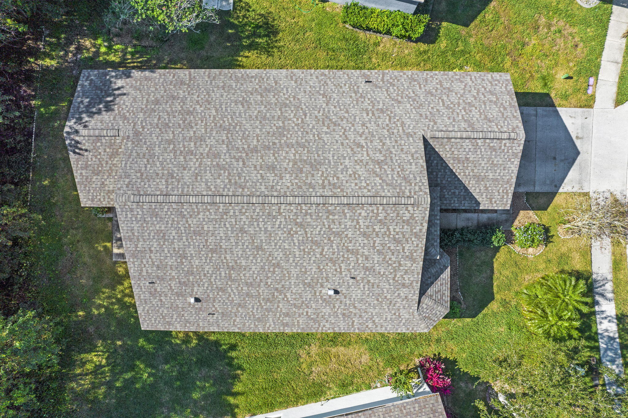 2140 Spring Creek Circle Palm Bay, FL 32905 - Photo 28 of 32 an aerial view of a house with a yard and a large pool
