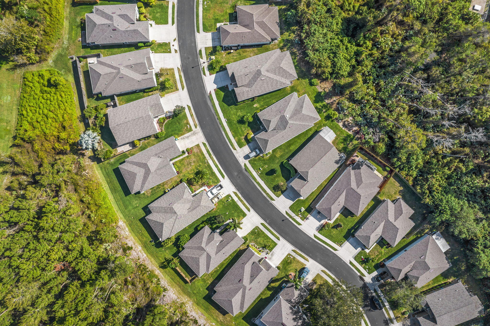 2140 Spring Creek Circle Palm Bay, FL 32905 - Photo 30 of 32 an aerial view of residential house with outdoor space and swimming pool
