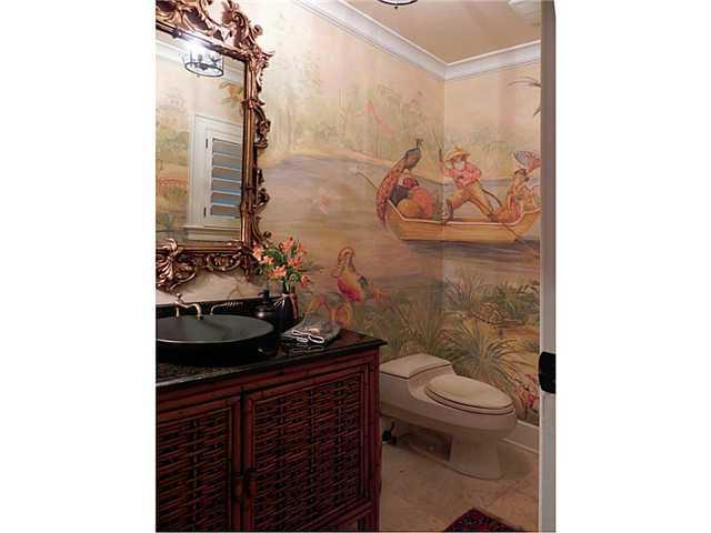 23 West High Point Road Sewall's Point, FL 34996 - Photo 8 of 25 a bathroom with a sink and a toilet