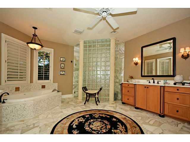 23 West High Point Road Sewall's Point, FL 34996 - Photo 10 of 25 a living room with large window