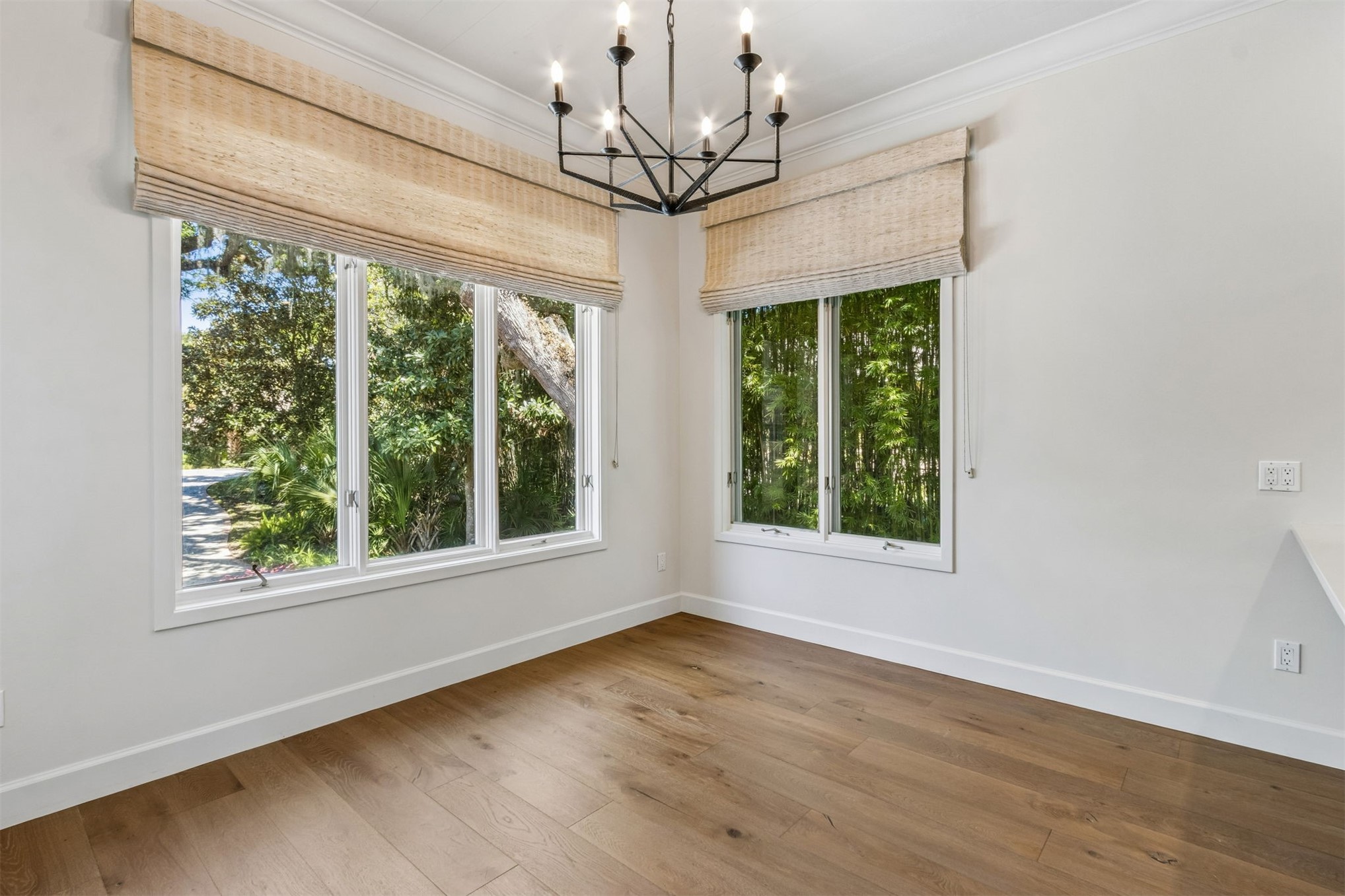 4 Salt Marsh Drive Fernandina Beach, FL 32034 - Photo 16 of 60 a view of an empty room with wooden floor and a window