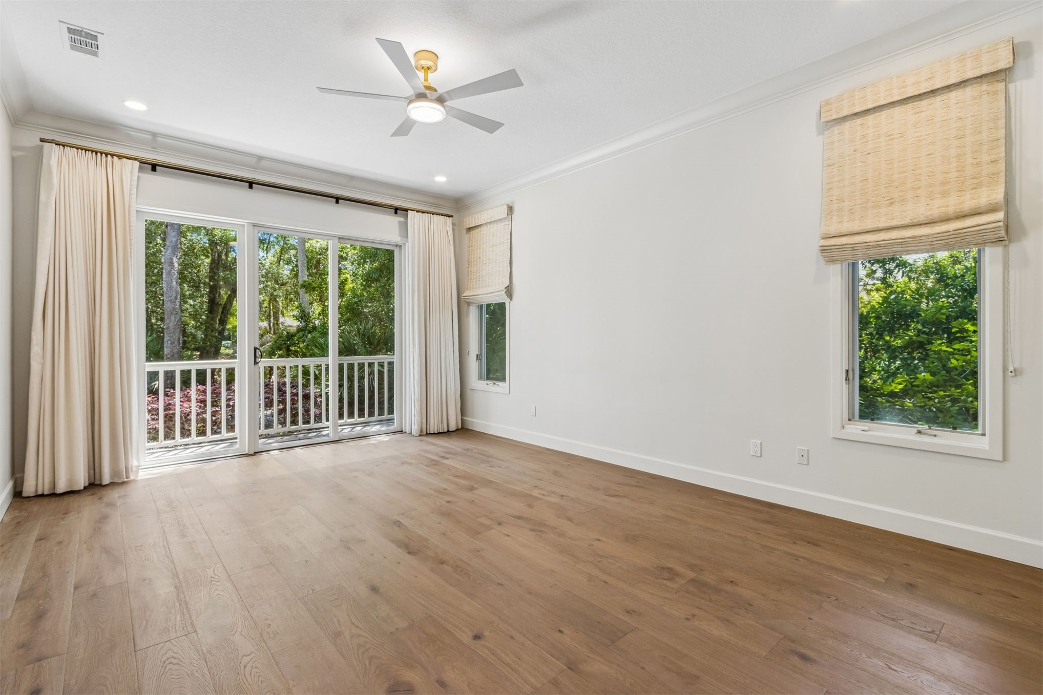 4 Salt Marsh Drive Fernandina Beach, FL 32034 - Photo 19 of 60 a view of a room with wooden floor and a large window