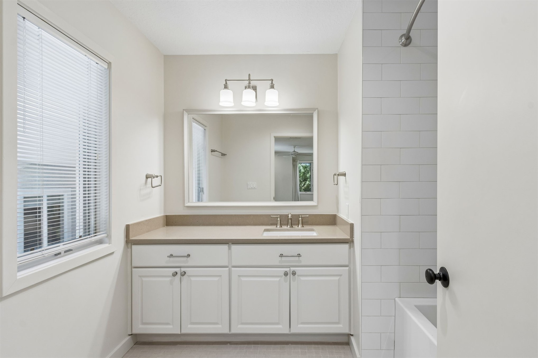 4 Salt Marsh Drive Fernandina Beach, FL 32034 - Photo 25 of 60 a bathroom with a sink and a mirror