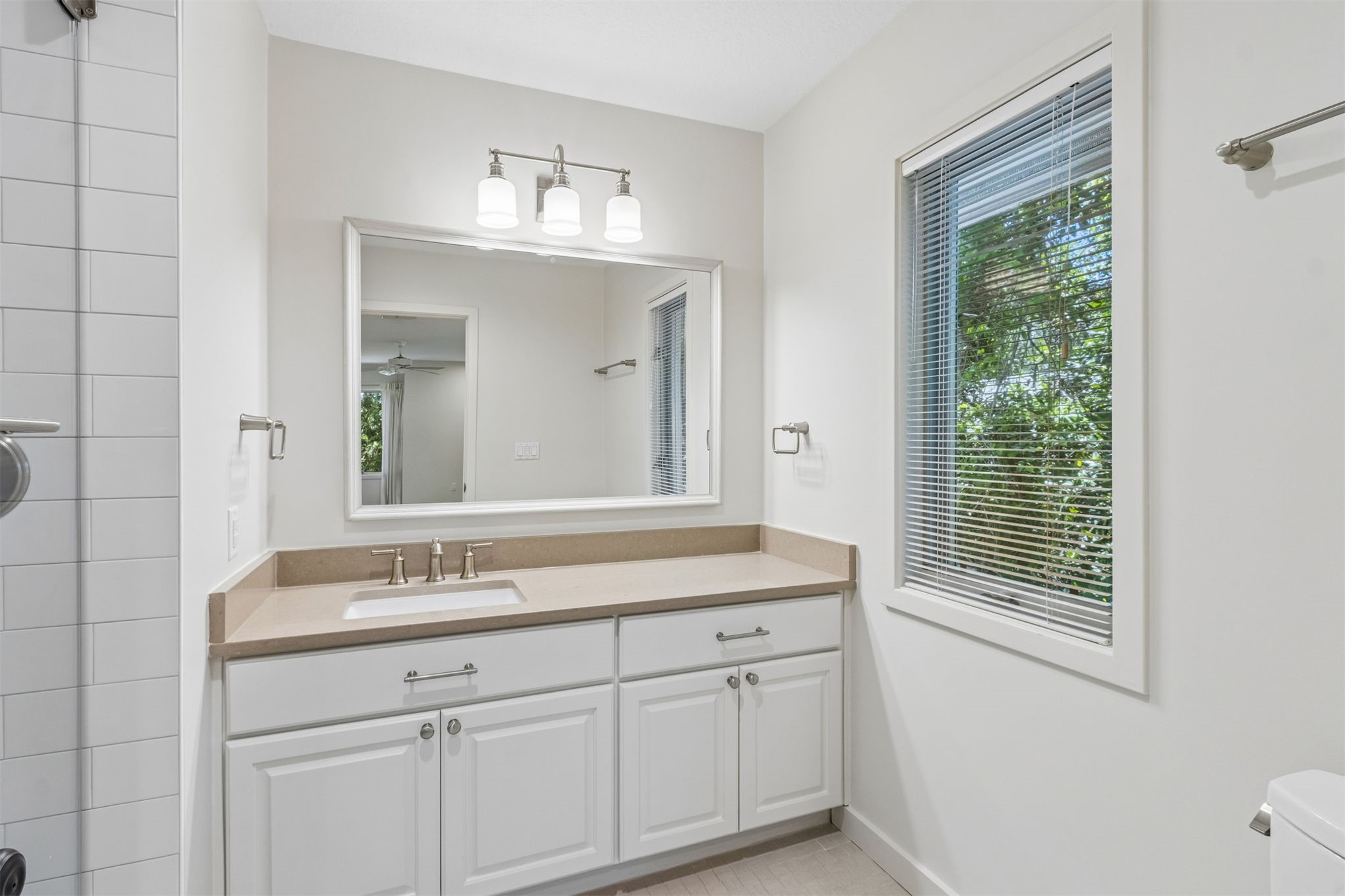 4 Salt Marsh Drive Fernandina Beach, FL 32034 - Photo 28 of 60 a bathroom with a sink and a mirror