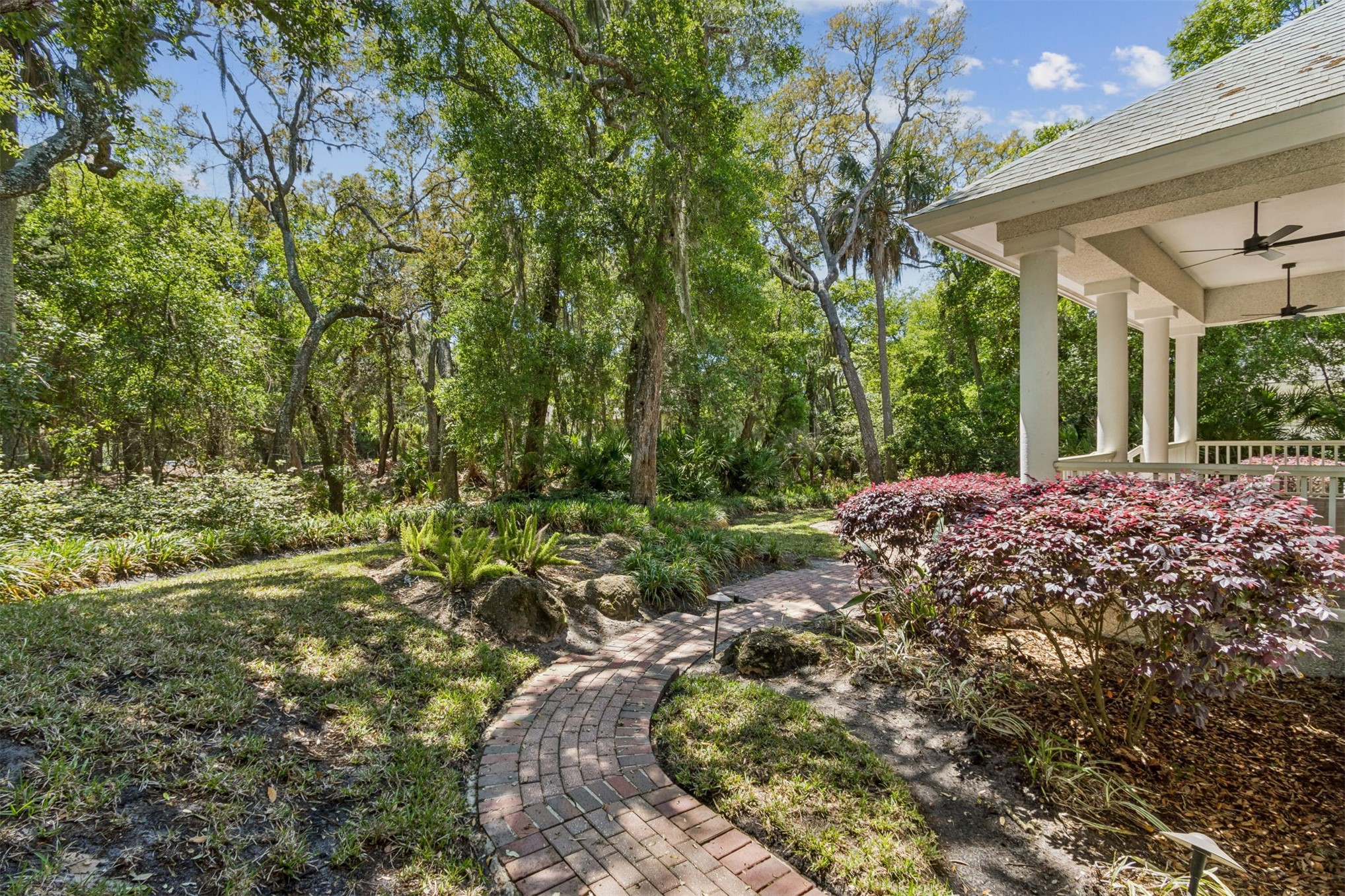 4 Salt Marsh Drive Fernandina Beach, FL 32034 - Photo 33 of 60 a view of a big yard with plants and large trees