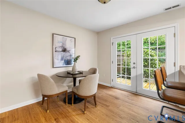 a view of a livingroom with furniture and a window