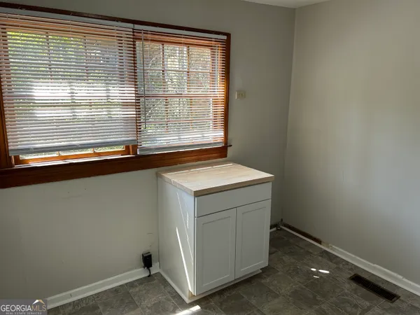 a view of utility room and window