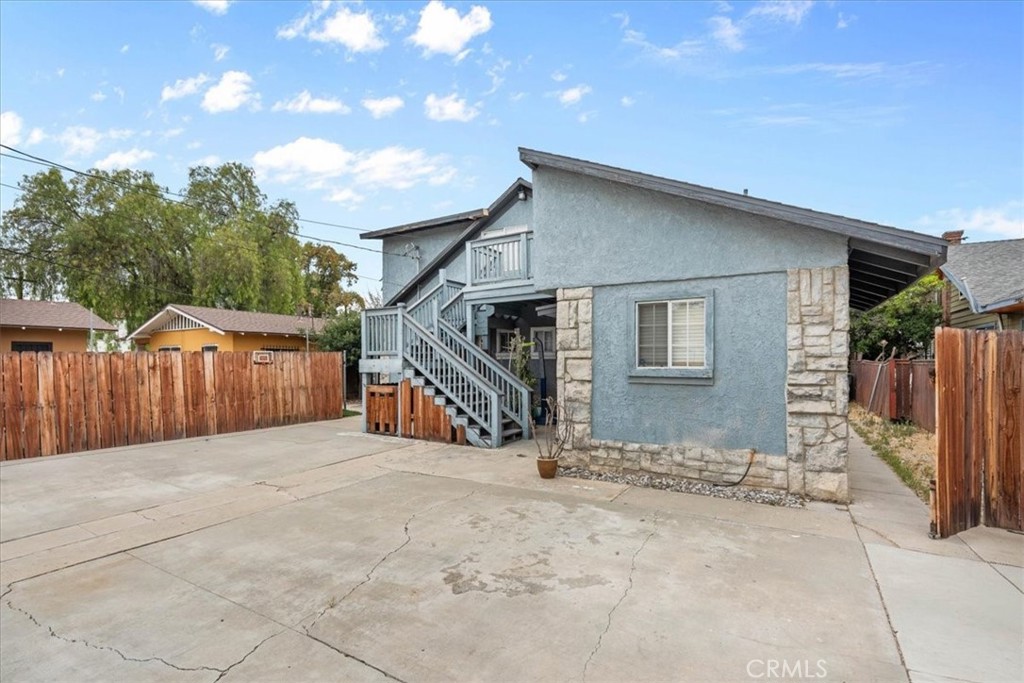 3974 5th Street Riverside, CA 92501 - Photo 5 of 45 a view of a house with wooden fence