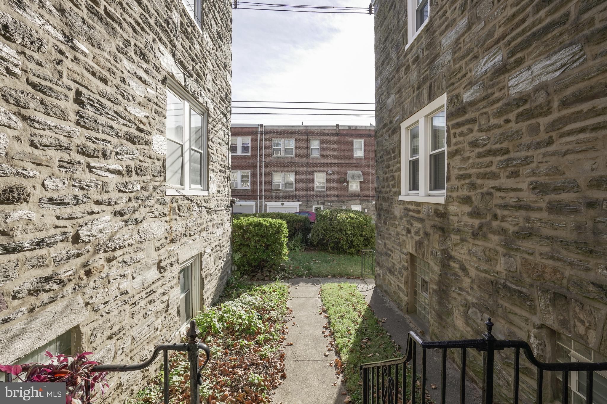 6931 Rutland Street Philadelphia, PA 19149 - Photo 3 of 33 Walk way to back of house