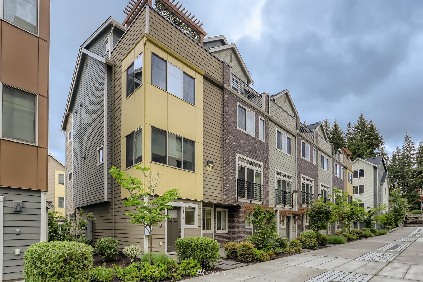 15873 Northeast 14th Road, Unit 7 7 Bellevue, WA 98008 - Photo 15 of 16 a front view of a multi story building