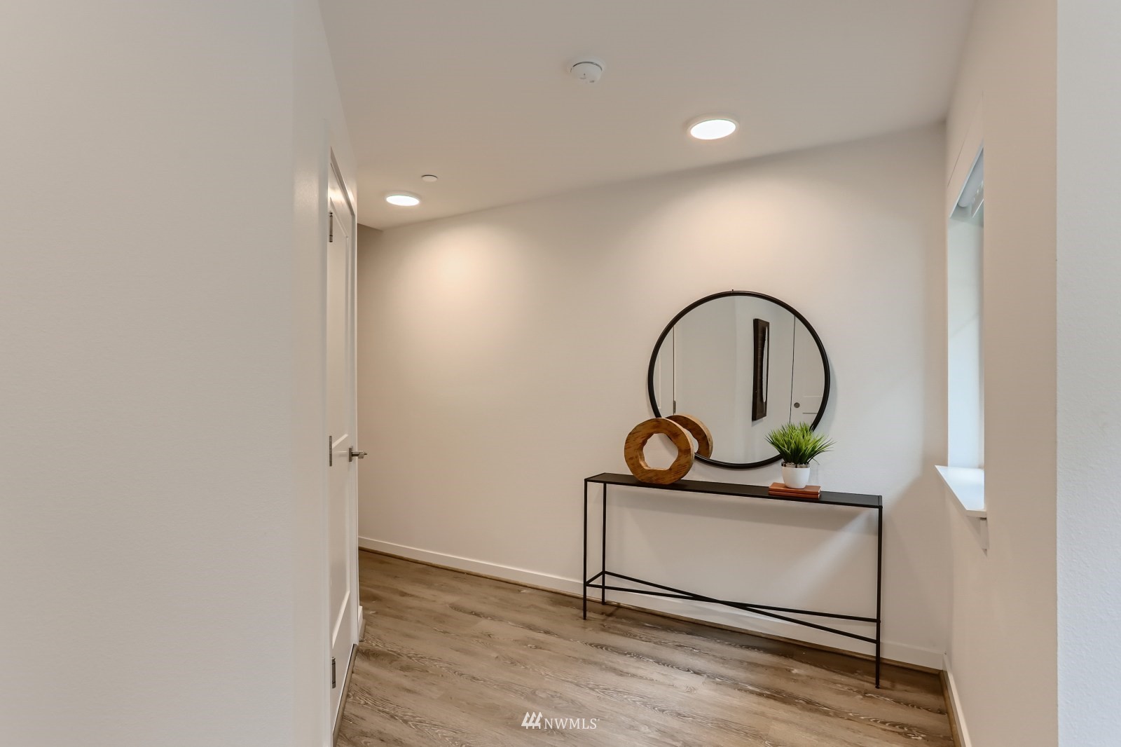 15873 Northeast 14th Road, Unit 7 7 Bellevue, WA 98008 - Photo 3 of 16 a view of a livingroom with furniture and a window