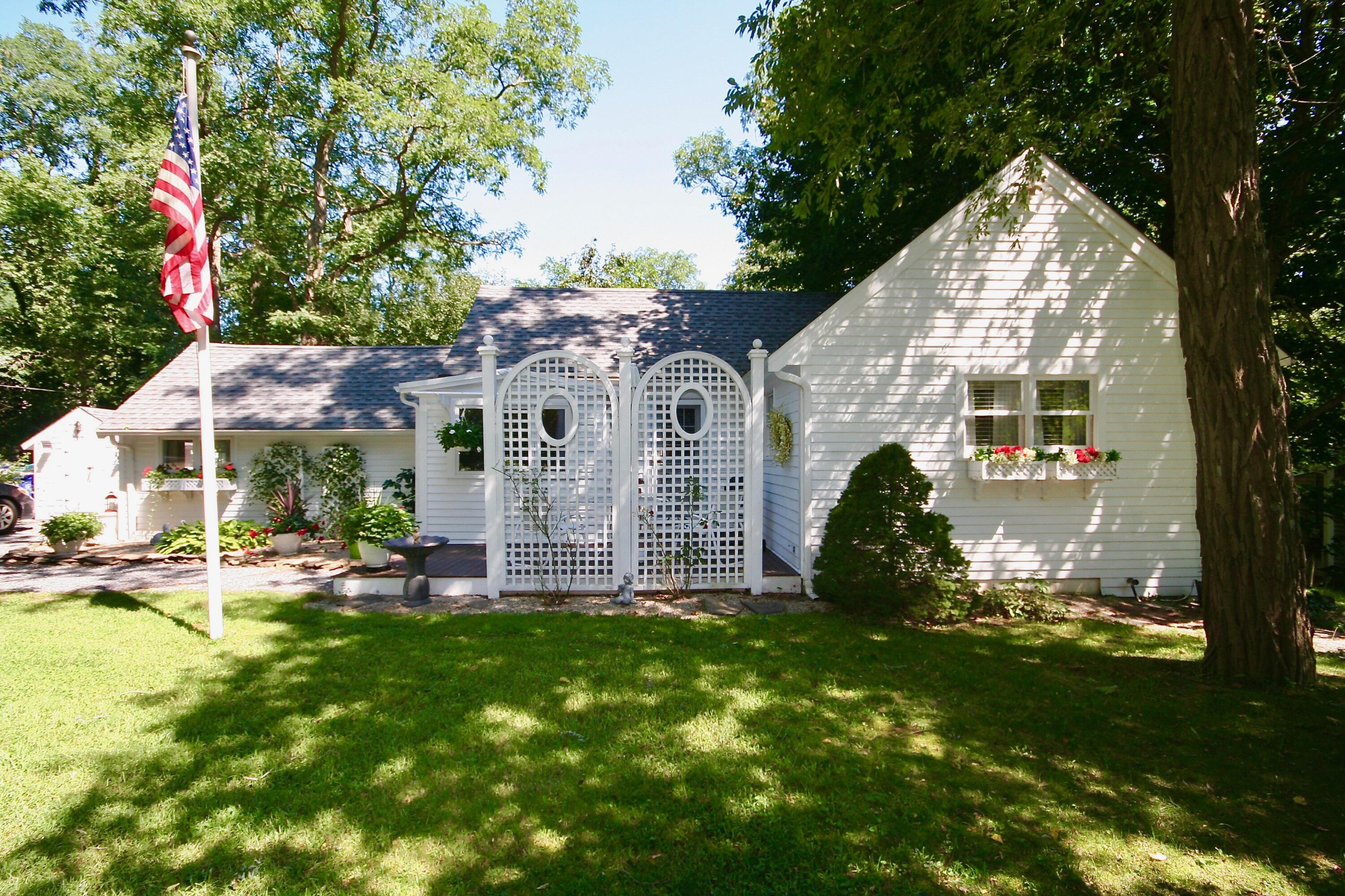 1243 County Road Cataumet, MA 02534 - Photo 3 of 27 a view of a house with backyard and garden