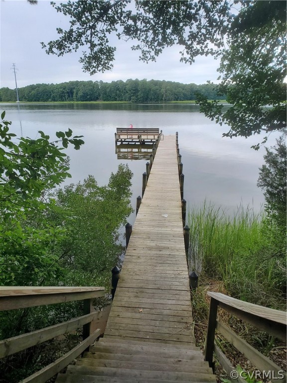 0 Pipe-N-Tree Drive Hartfield, VA 23071 - Photo 4 of 10 a view of a lake with outdoor space