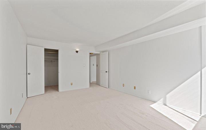 118 Monroe Street, Unit 1181109 Rockville, MD 20850 - Photo 18 of 41 a view of an empty room