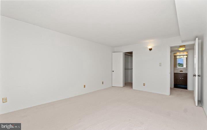118 Monroe Street, Unit 1181109 Rockville, MD 20850 - Photo 28 of 41 an empty room with entrance and view