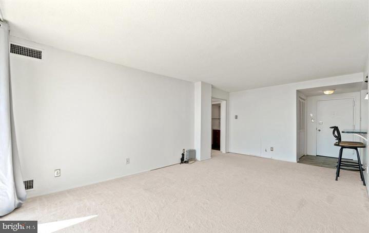 118 Monroe Street, Unit 1181109 Rockville, MD 20850 - Photo 30 of 41 a view of an empty room