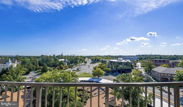 118 Monroe Street, Unit 1181109 Rockville, MD 20850 - Photo 32 of 41 a view of a city skyline from a balcony