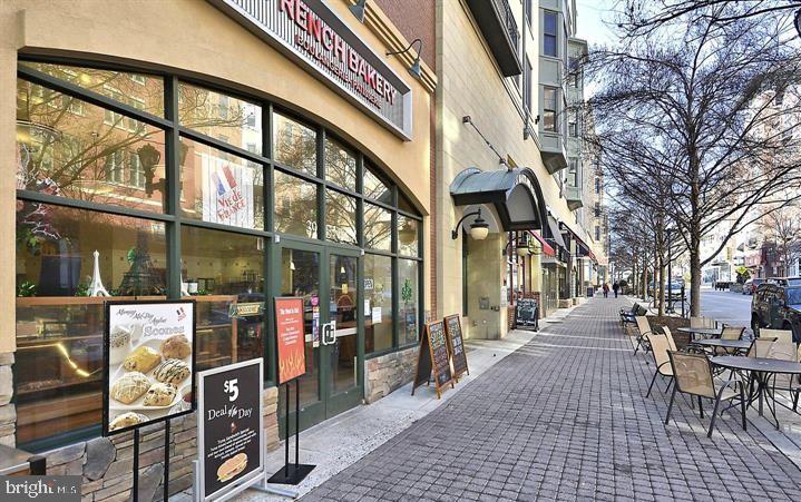 118 Monroe Street, Unit 1181109 Rockville, MD 20850 - Photo 36 of 41 a view of a building with sitting area
