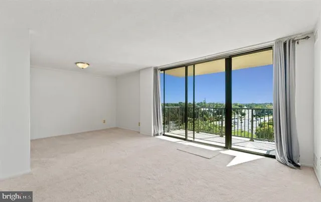 a view of an empty room and window