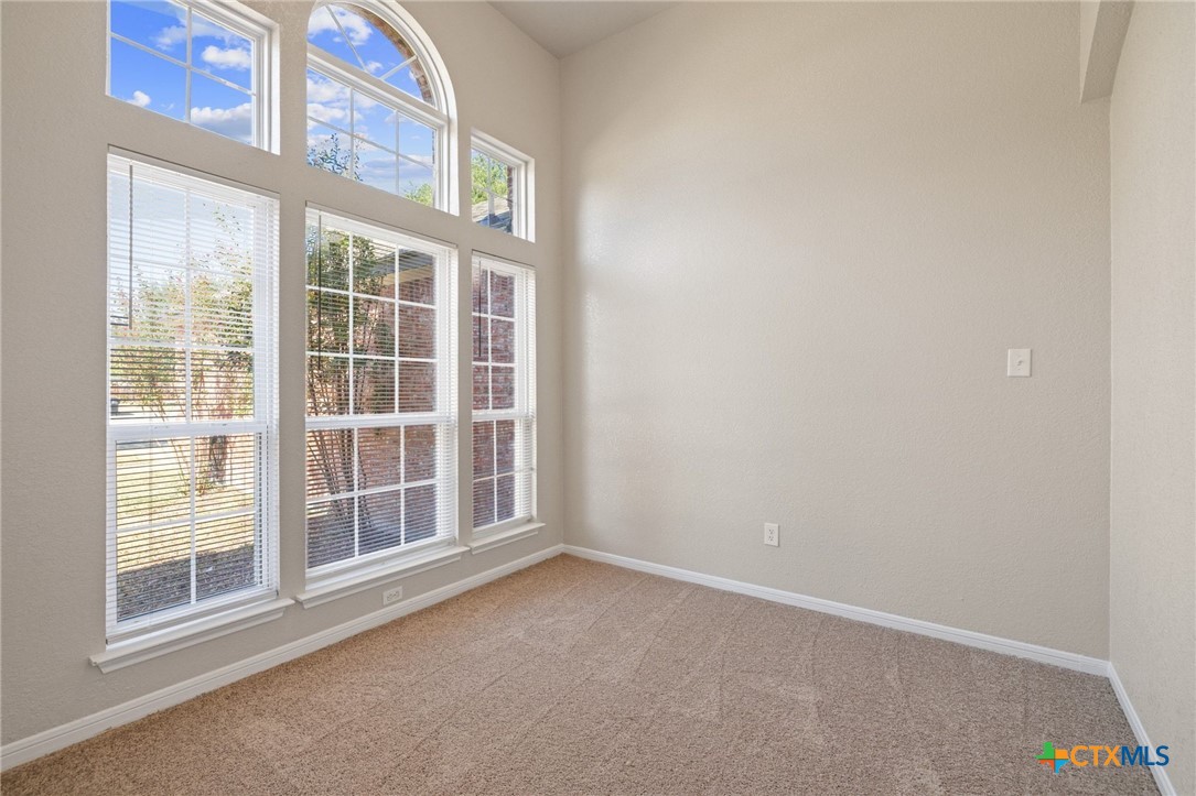 5607 Aberdeen Court Temple, TX 76502 - Photo 18 of 30 a view of an empty room with a window