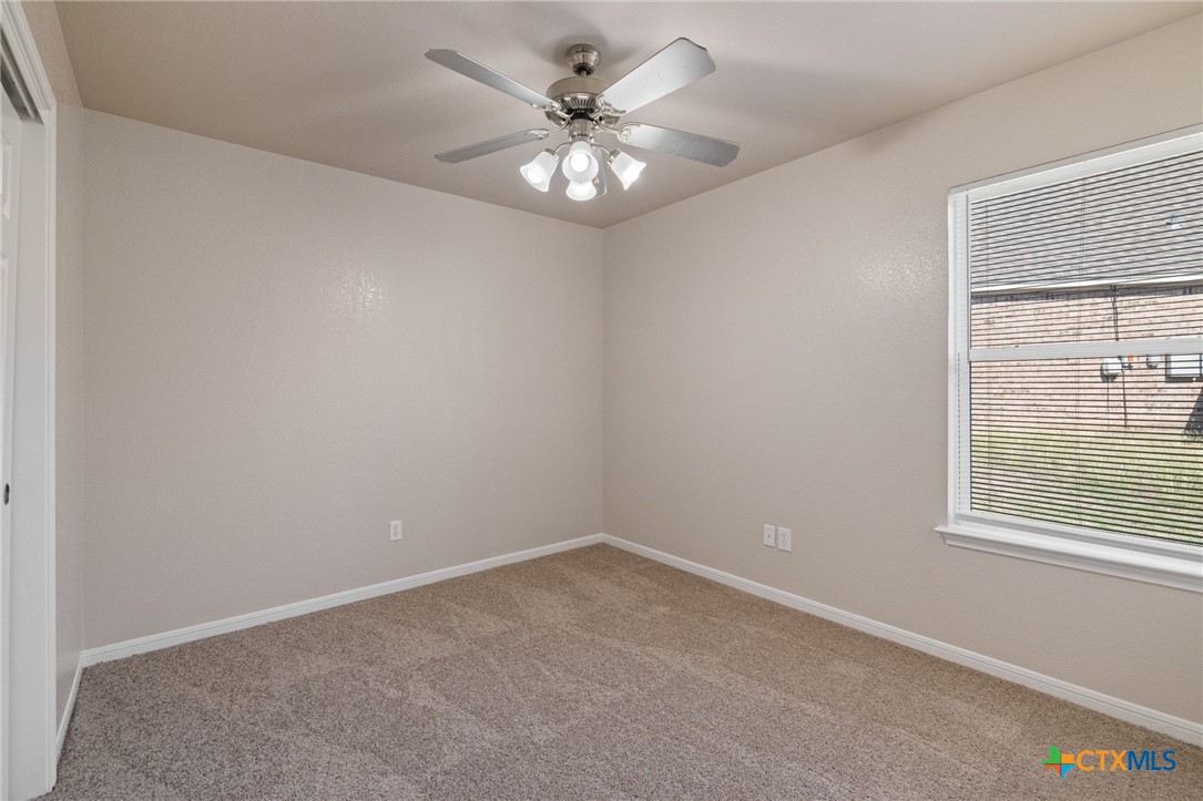 5607 Aberdeen Court Temple, TX 76502 - Photo 19 of 30 a view of an empty room with a window