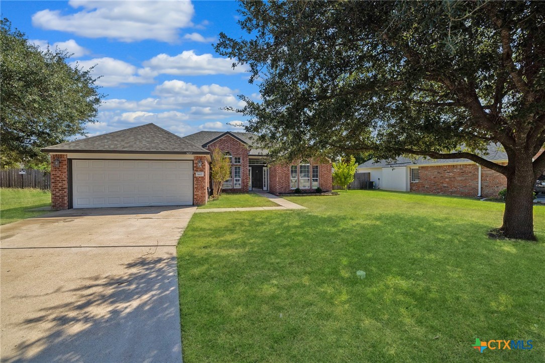 5607 Aberdeen Court Temple, TX 76502 - Photo 2 of 30 a front view of house with yard and trees