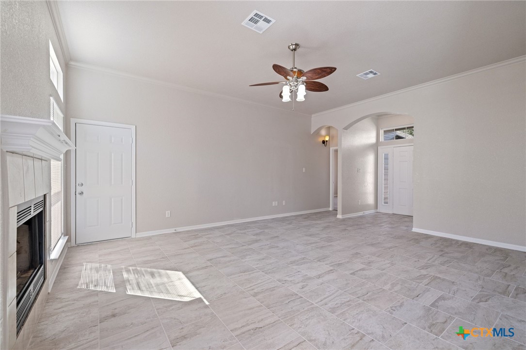 5607 Aberdeen Court Temple, TX 76502 - Photo 9 of 30 a view of an empty room with a fireplace