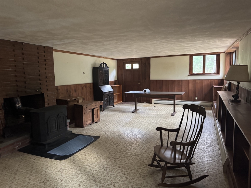 628 Stow Road Boxborough, MA 01719 - Photo 5 of 5 a living room with furniture