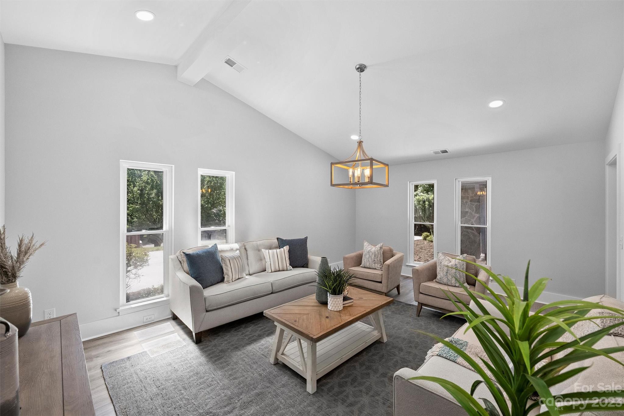 4600 Rounding Run Road Charlotte, NC 28277 - Photo 12 of 33 a living room with furniture plant and a window