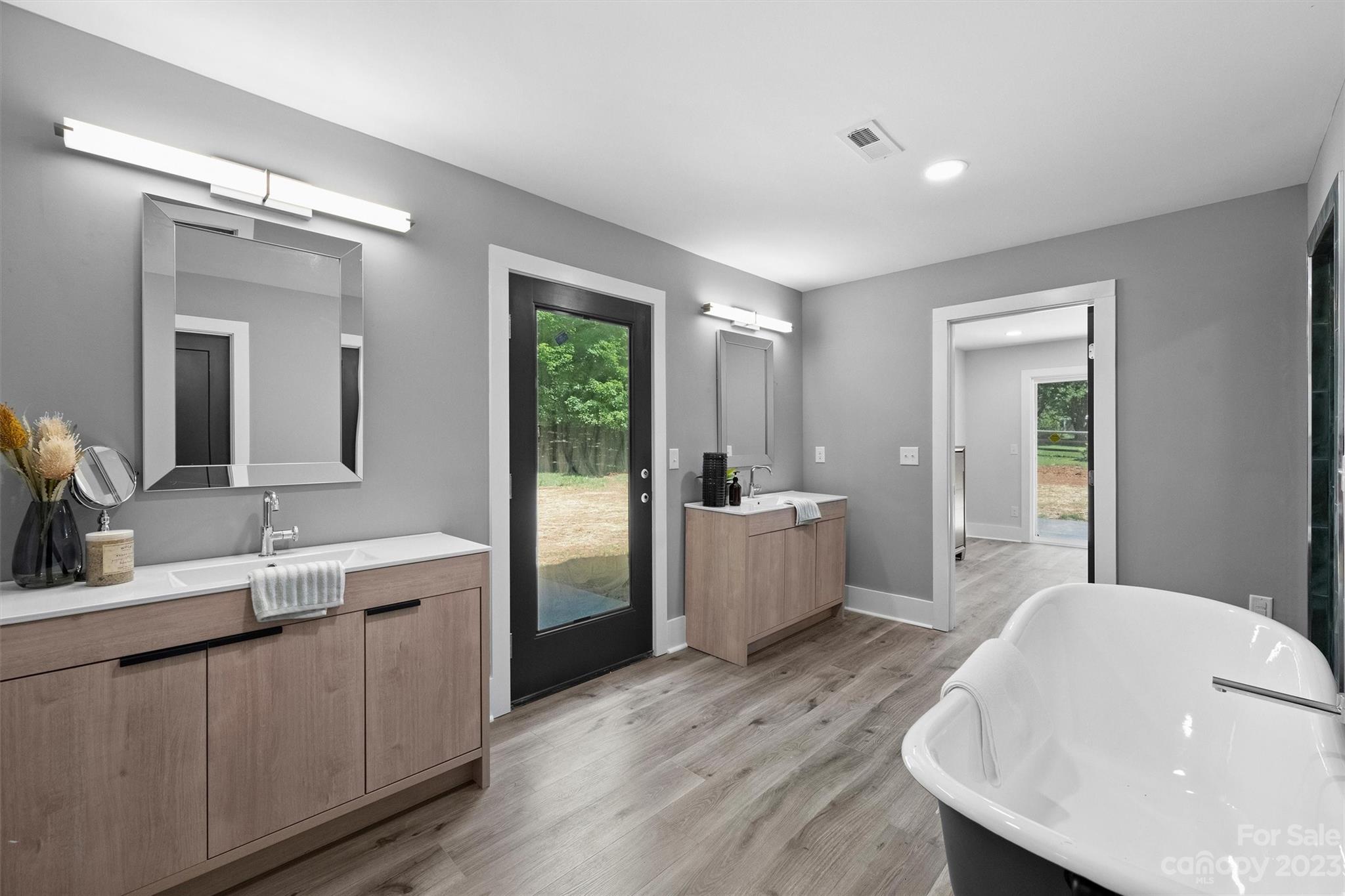 4600 Rounding Run Road Charlotte, NC 28277 - Photo 21 of 33 a large white room with a large window and sink
