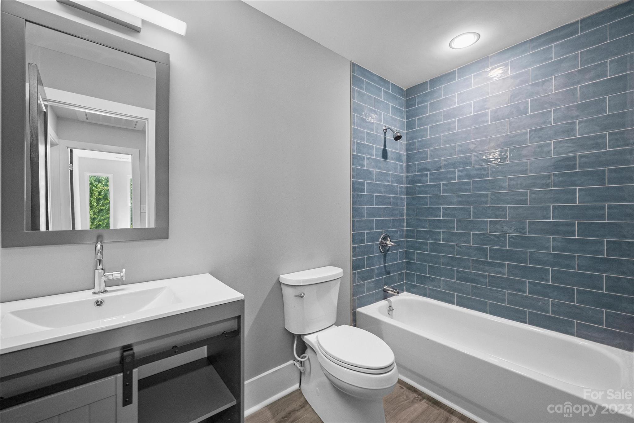 4600 Rounding Run Road Charlotte, NC 28277 - Photo 26 of 33 a bathroom with a sink a toilet and bathtub