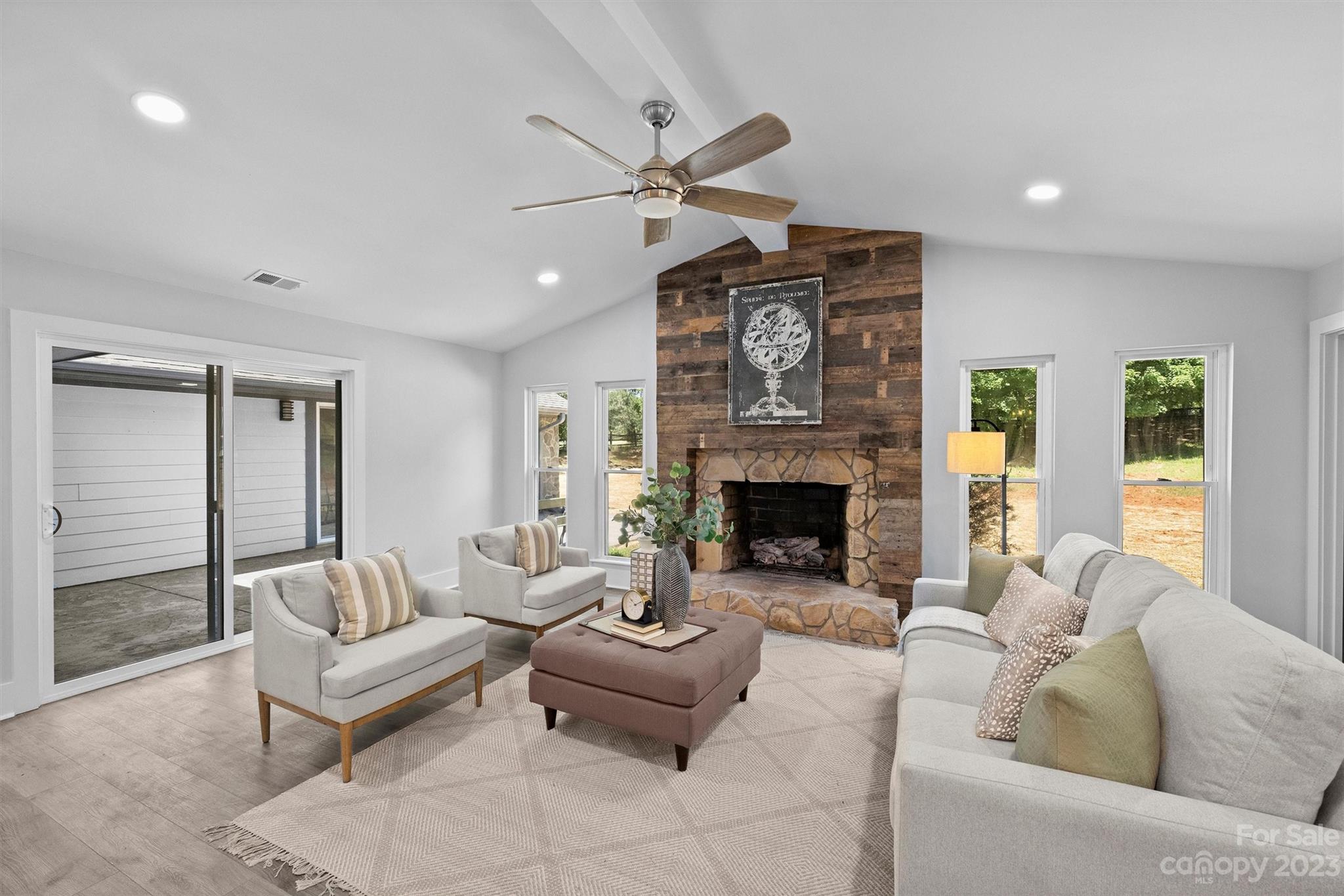 4600 Rounding Run Road Charlotte, NC 28277 - Photo 9 of 33 a living room with furniture and a fireplace