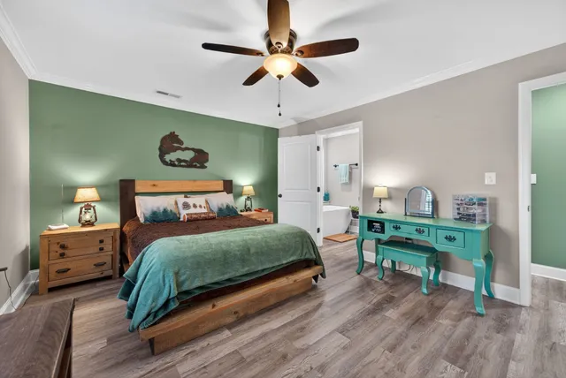 a bedroom with a bed and a table