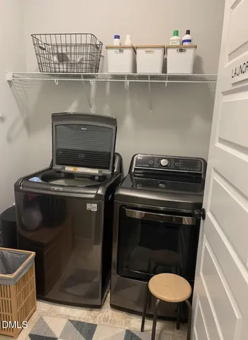 a stove top oven sitting inside of a kitchen