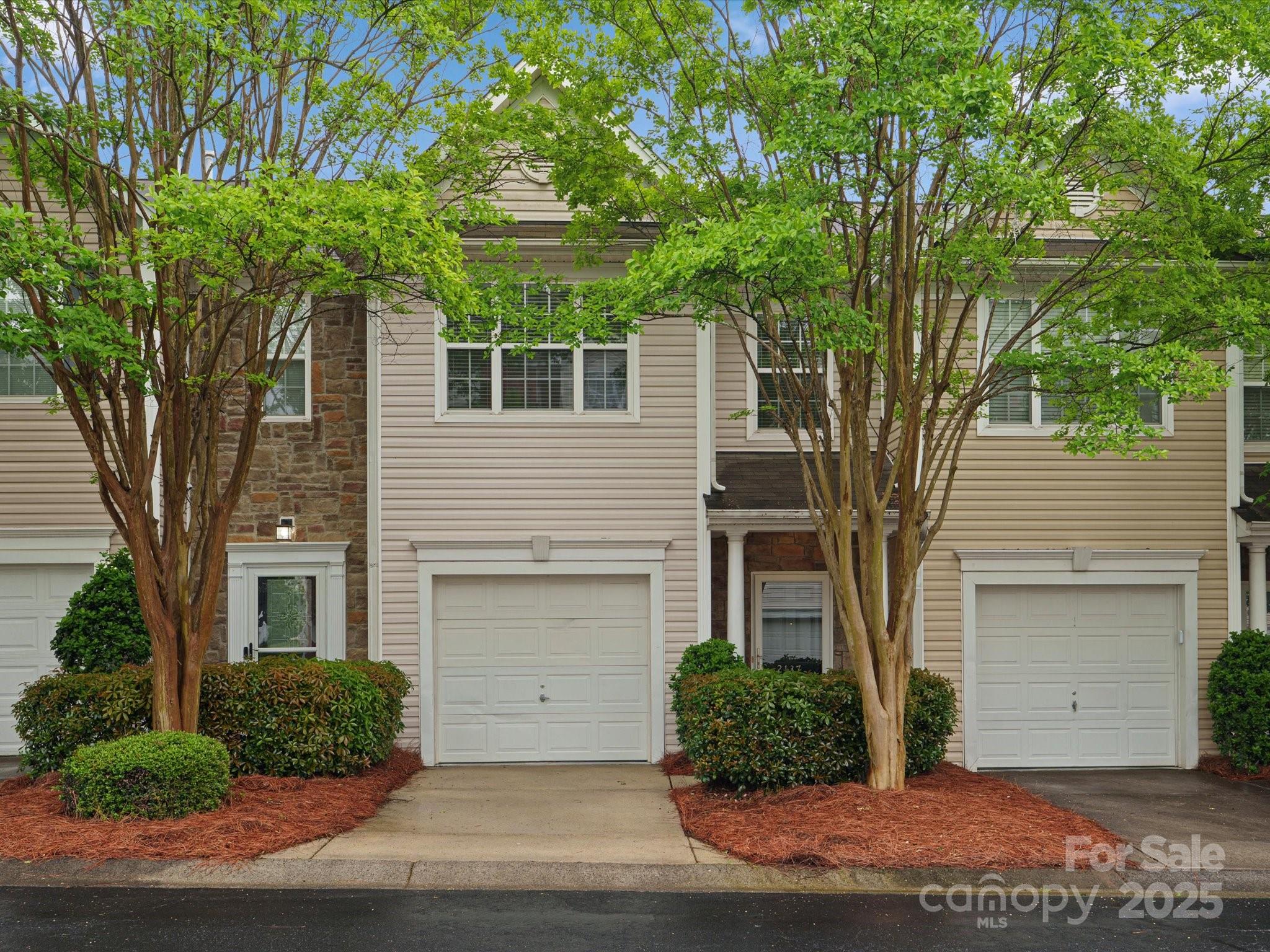 2137 Midnight Blue Lane Fort Mill, SC 29708 - Photo 1 of 40 a front view of a house with a yard
