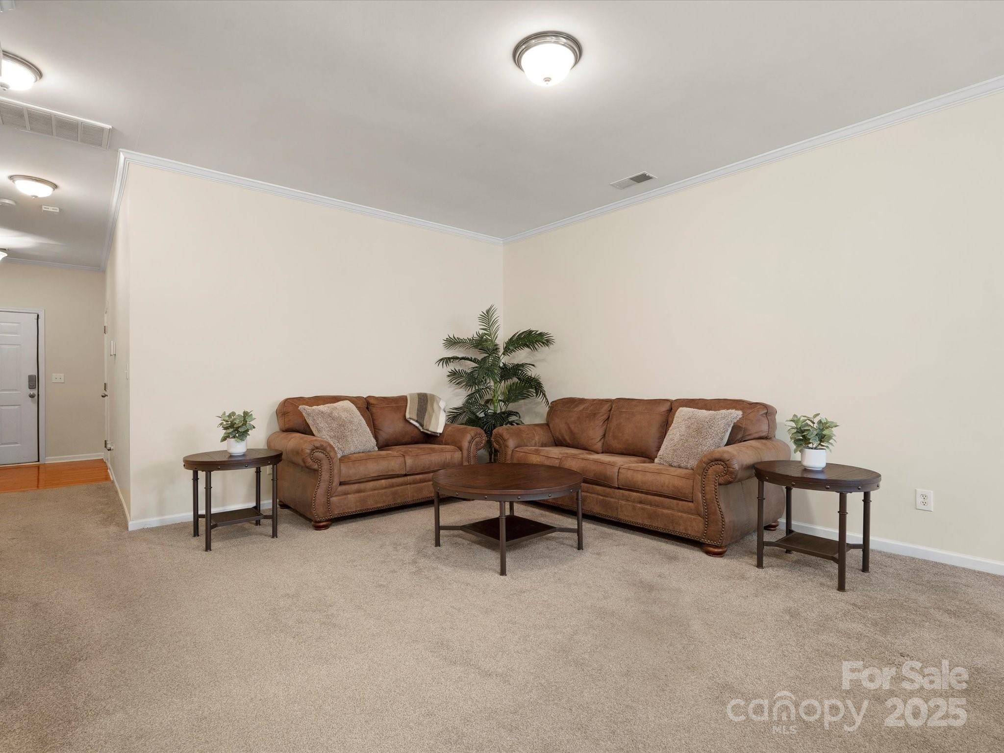 2137 Midnight Blue Lane Fort Mill, SC 29708 - Photo 12 of 40 a living room with furniture and a table