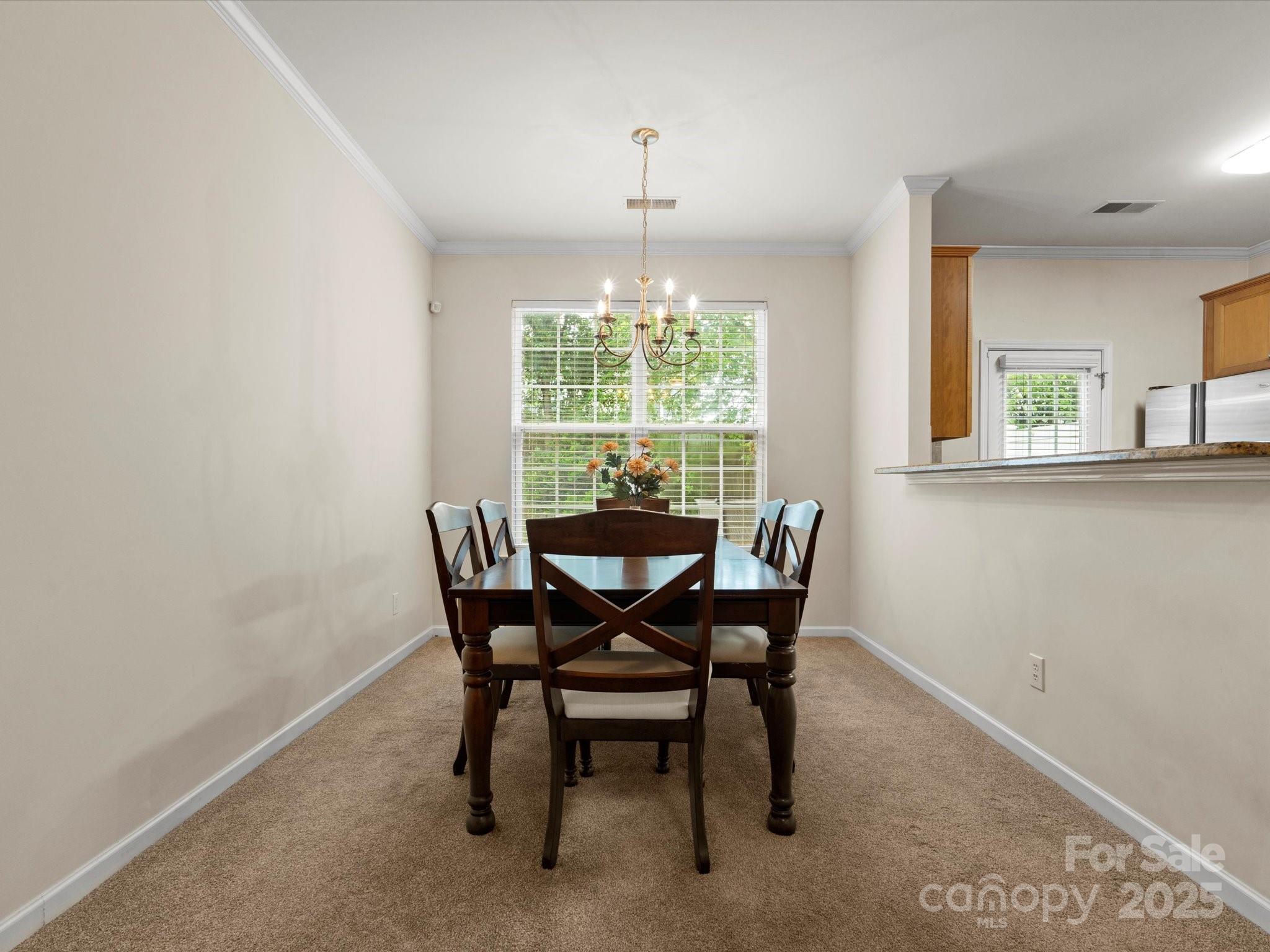 2137 Midnight Blue Lane Fort Mill, SC 29708 - Photo 13 of 40 a dining room with furniture and window