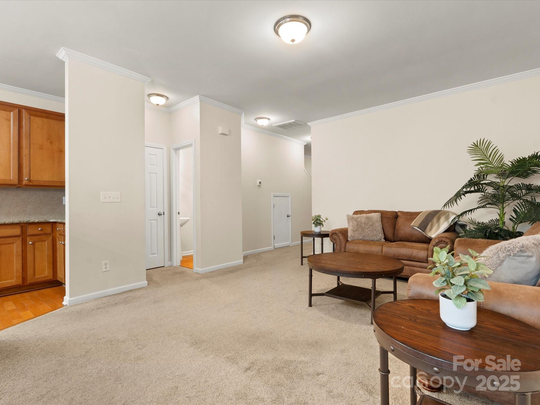 2137 Midnight Blue Lane Fort Mill, SC 29708 - Photo 15 of 40 a living room with furniture and wooden floor